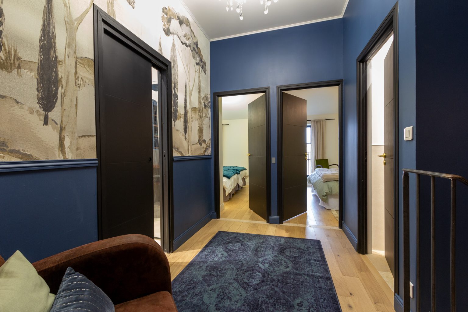 4 doors, shower room and bedroom 3 are to the left, to the right are bedroom 2 and a WC, a further WC is on the ground floor