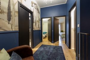 4 doors, shower room and bedroom 3 are to the left, to the right are bedroom 2 and a WC, a further WC is on the ground floor