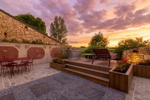 The feature exterior bath and what a view, ideal to watch the sunset at Blanchet luxury holiday home in Southwest France, overlooking the rolling valley views between Bordeaux and Bergerac.