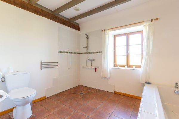 Bath, wet room shower and wc, there is a further separate wc