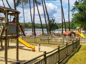 Le Grand Etang de La Jemaye, a great day out for all the family with a sandy beach, lake swimming, play grounds, cafes, canoes and walks. 45km away