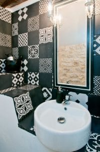 4. Black and white room, has its own walk-in shower and separate wc with wash basin.