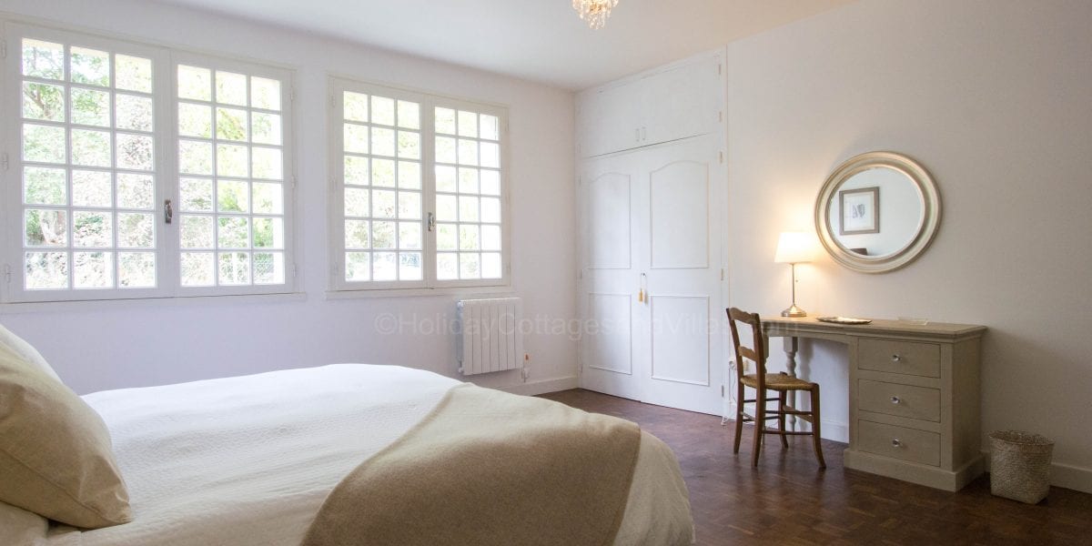 Bedroom 1, all bedroom windows in Maison de Tilleul have shutters
