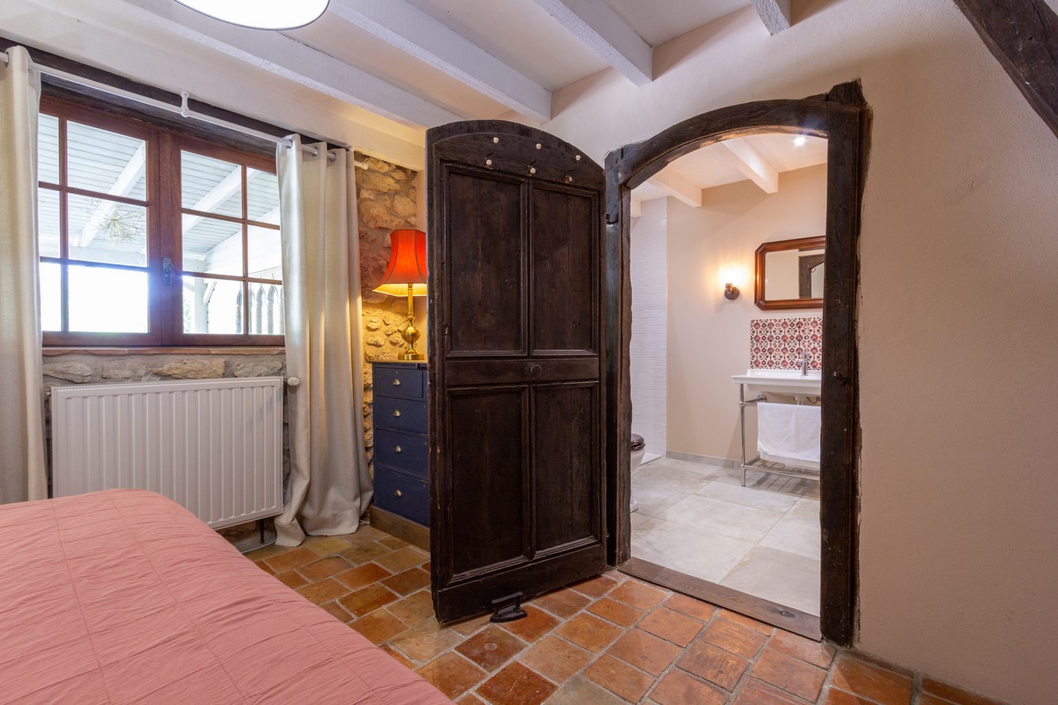 Bedroom 1, looking into the shower room and wc