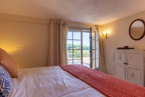 Bedroom 3 opens out onto a terrace with wonderful views, lower floor
