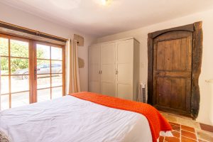 Bedroom 4 over looks the terrace to the side of the house and the driveway, lower floor