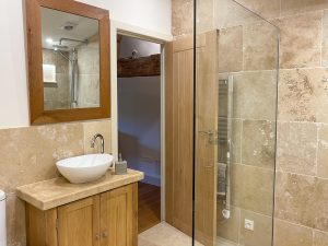 Bedroom 4 walk in shower, bath and wash basin