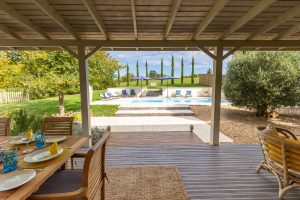 Covered shaded terrace looking to the pool