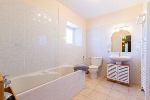 Family bathroom and shower shared with and next to bedrooms 2, 3 and 4