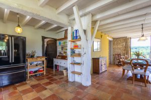 From the kitchen looking to the dining table and view