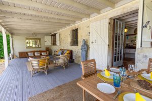 From the kitchen to the shaded dining and seating area