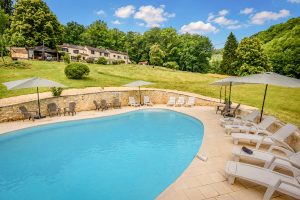 From the pool looking towards the appartments at Beau Foret, Font Neuve near Souillac, Dordogne Valley, France