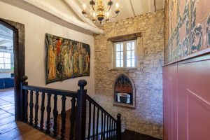 From the sitting room, bedrooms 1 and 2, the kitchen is to the left, stairs down to the TV lounge and bedrooms 3 and 4