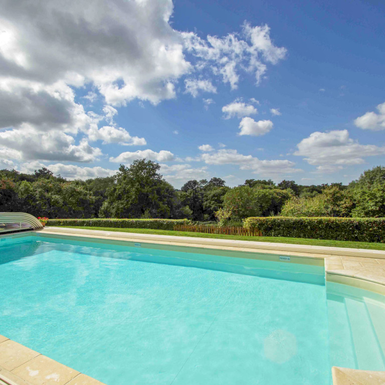 Holiday cottage in France with a pool and fishing next to a river