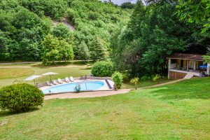 Looking down to the pool, also the Sauna & hot tub at Beau Foret, Font Neuve near Souillac, Dordogne Valley, France