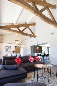 Open plan living space with double height ceilings