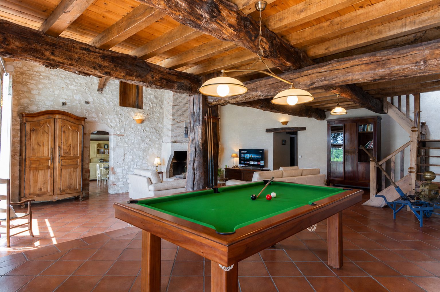 Jubin pool table and the lounge, looking through to the kitchen