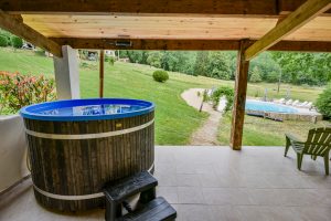Shared wood fired hot tub at Beau Foret, it's also known as Font Neuve holiday villas near Souillac, Dordogne Valley, France