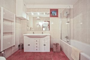 The bathroom with an in bath shower