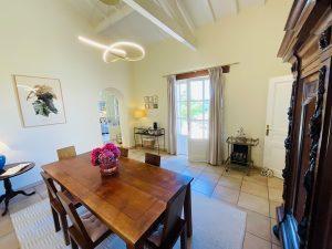 The dining room is next to the kitchen