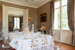 The dining room with a view of the pool area to the right, Château de Bel Air, Lalande-de-Pomerol near Bordeaux, France