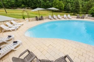 The large 13 x 6m heated shared pool at Beau Foret, Font Neuve near Souillac, Dordogne Valley, France