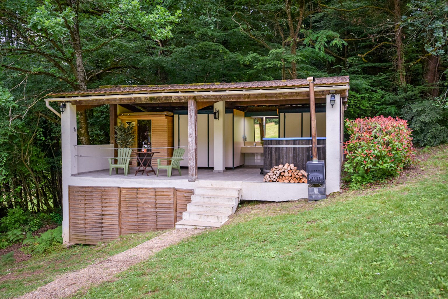 The sauna is to the left, the hot tub is wood fired at Beau Foret, it's also known as Font Neuve holiday villas near Souillac, Dordogne Valley, France