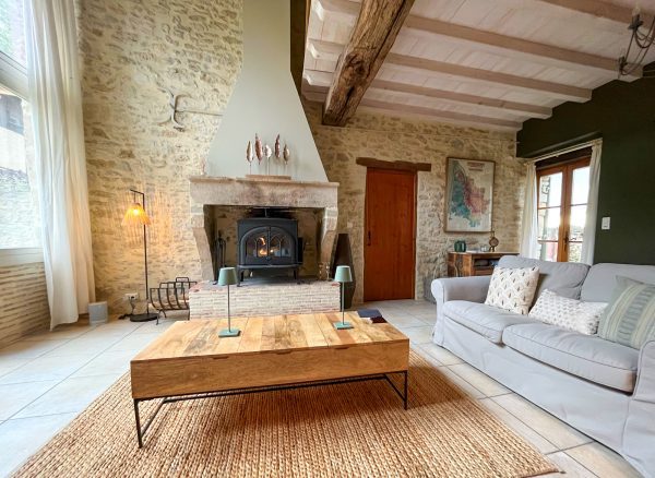 The sitting room and stone fireplace