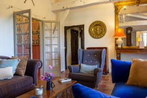 The sitting room, left is to the staircase, the doorway leads to bedrooms 1 and 2