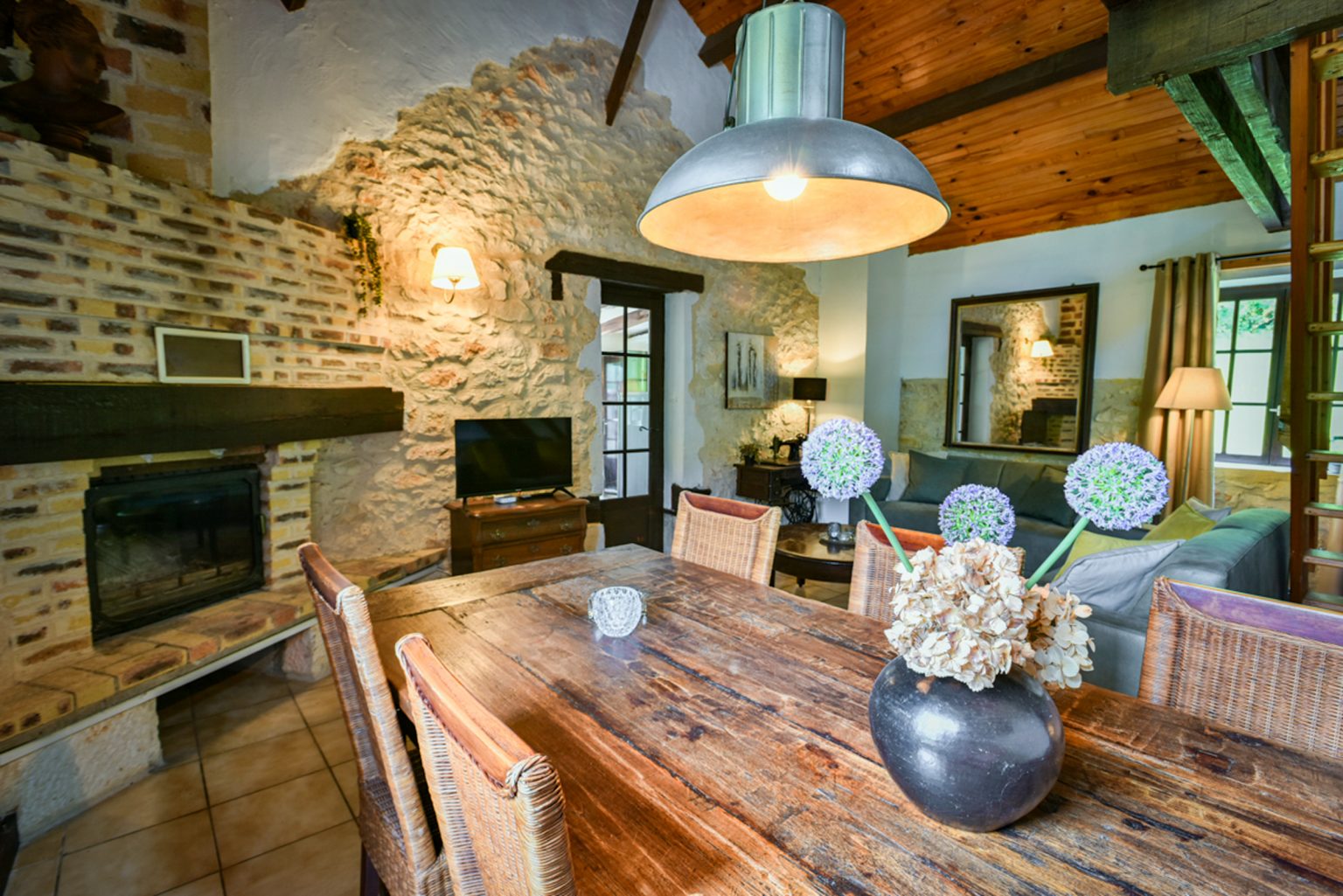 Lounge at Dining table at Jasmijn Villa, Beau Foret, Font Neuve near Souillac, Dordogne Valley, France.