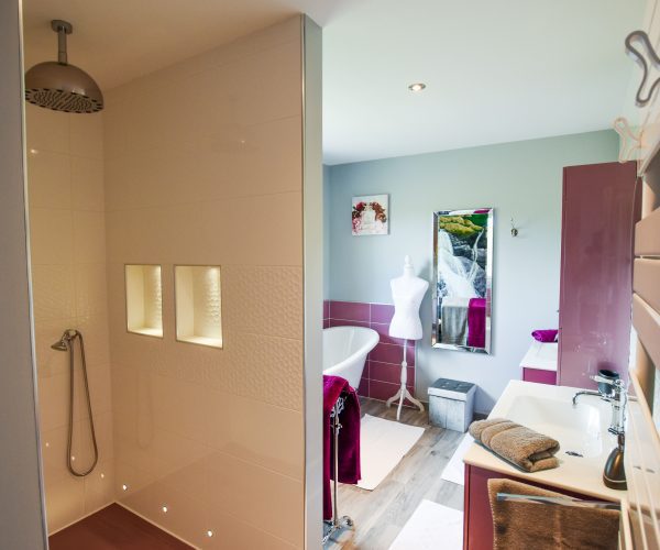 Walk in shower, bath and a separate wc is shared by bedrooms 2 and 3 