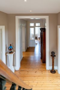 Walking down from the top floor to the first floor, then the staircase takes you to the ground floor