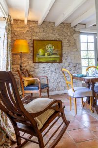 Walking into the dining room form the sitting room, the kitchen is to the right